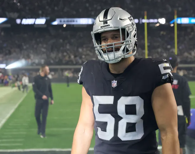 LAS VEGAS, NEVADA - JANUARY 09: Linebacker Kyle Wilber #58 of the Las Vegas Raiders walks off the field after the team's 35-32 overtime victory over the Los Angeles Chargers at Allegiant Stadium on January 9, 2022 in Las Vegas, Nevada. (Photo by Ethan Miller/Getty Images)