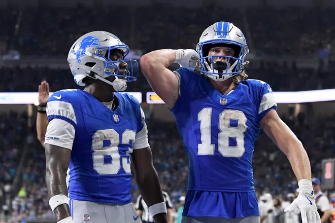 Aug 16, 2025; Detroit, Michigan, USA; Detroit Lions wide receiver Isaac TeSlaa (18) celebrates with Detroit Lions wide receiver Jackson Meeks (83) after scoring a touchdown against the Miami Dolphins in the second quarter at Ford Field. Mandatory Credit: Eamon Horwedel-Imagn Images