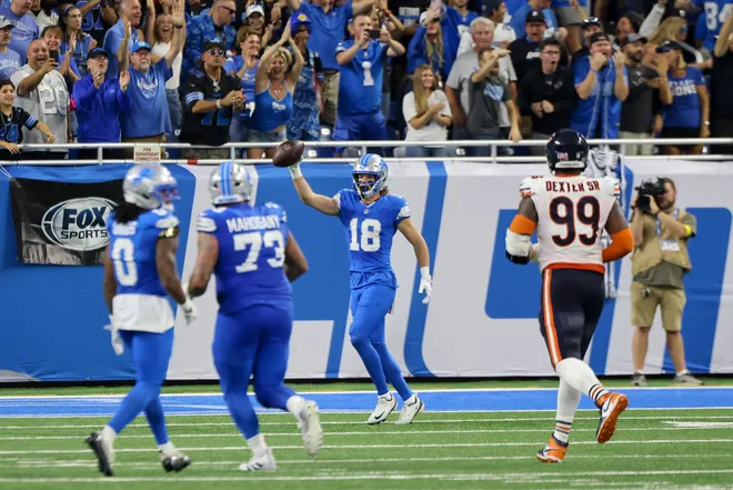 Sep 14, 2025; Detroit, Michigan, USA; Detroit Lions wide receiver Isaac TeSlaa (18) celebrates after a reception against the Chicago Bears during the second quarter of the game at Ford Field. Mandatory Credit: David Reginek-Imagn Images