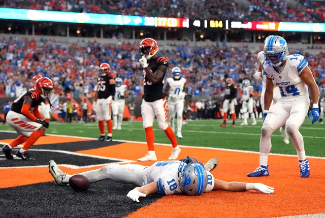 CINCINNATI, OHIO - OCTOBER 05: Isaac Teslaa #18 of the Detroit Lions celebrates a fourth quarter touchdown against the Cincinnati Bengals at Paycor Stadium on October 05, 2025 in Cincinnati, Ohio. (Photo by Dylan Buell/Getty Images)