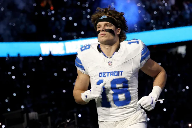 DETROIT, MICHIGAN - DECEMBER 04: Isaac Teslaa #18 of the Detroit Lions walks out of the tunnel before the game against the Dallas Cowboys at Ford Field on December 04, 2025 in Detroit, Michigan. (Photo by Mike Mulholland/Getty Images)