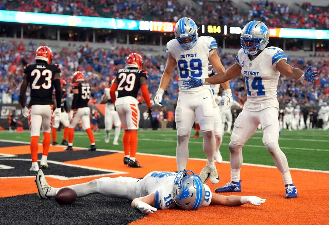 CINCINNATI, OHIO - OCTOBER 05: Isaac Teslaa #18 of the Detroit Lions celebrates a fourth quarter touchdown against the Cincinnati Bengals at Paycor Stadium on October 05, 2025 in Cincinnati, Ohio. (Photo by Dylan Buell/Getty Images)