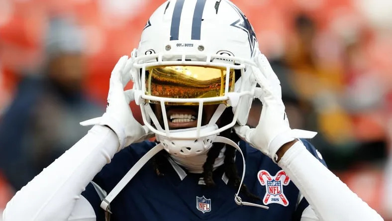 Trevon Diggs warms up before a Cowboys road game against the Commanders at Northwest Stadium.