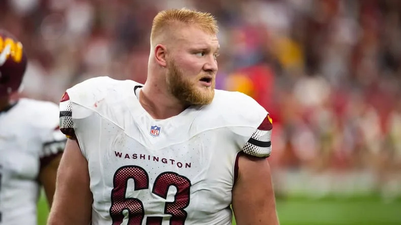 Tyler Biadasz lines up at center for Washington against the Cardinals at State Farm Stadium.
