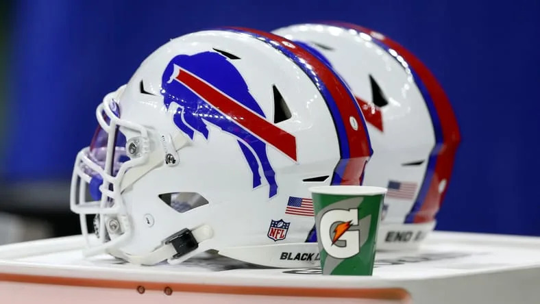 Buffalo Bills helmets sit along the sideline during a game in New Orleans. Justin Jefferson trade rumors.