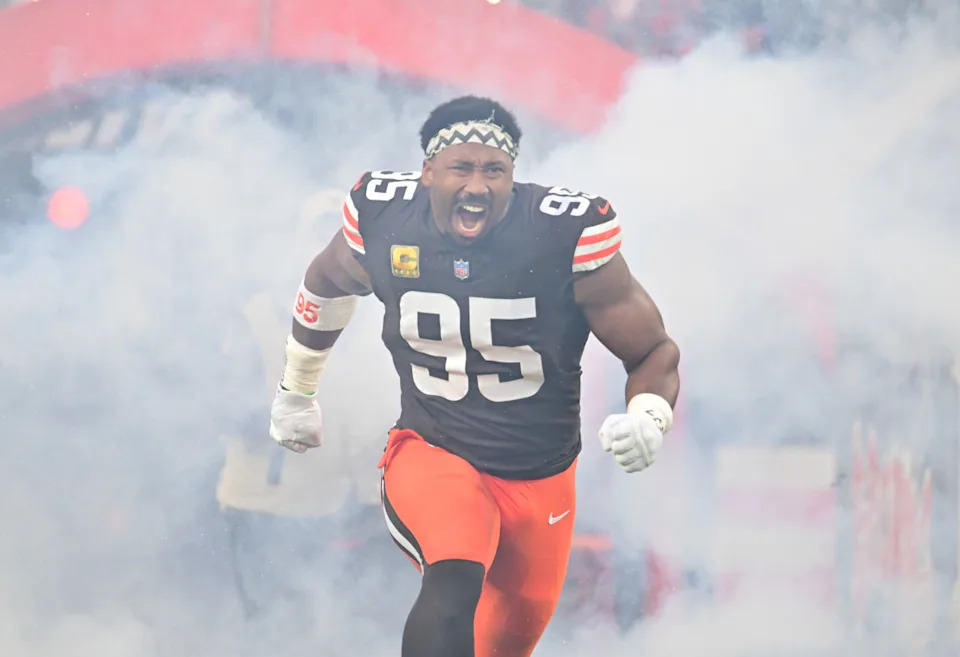 Cleveland Browns defensive end Myles Garrett (95) runs out during player introductions prior to a game against Baltimore Ravens at Huntington Bank Field.Ken Blaze-Imagn Images