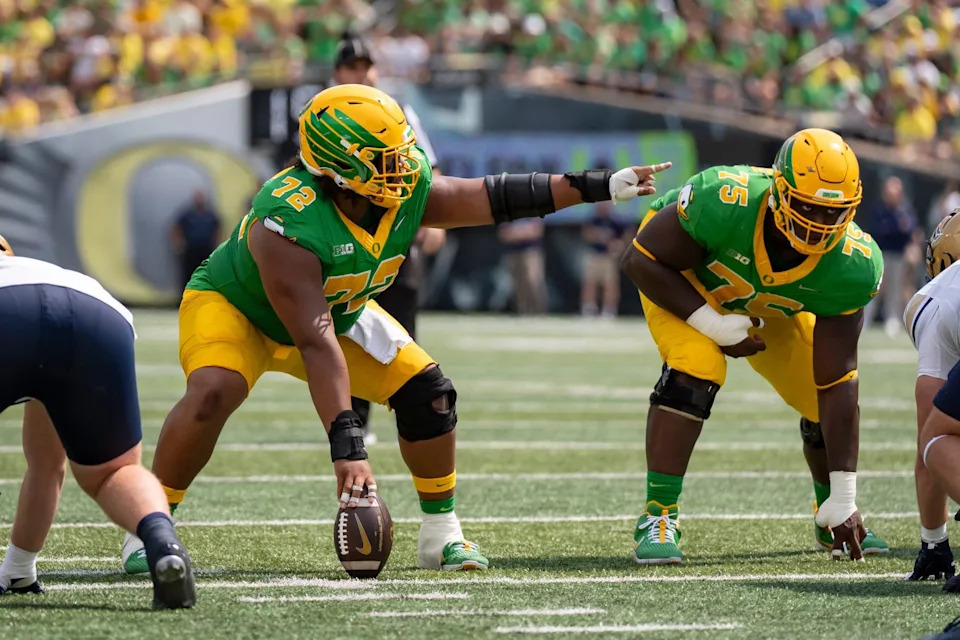 Oregon offensive linemen Iapani Laloulu, left, and Emmanuel Pregnon line up as the Oregon Ducks host the Montana State Bobcats on Aug. 30, 2025, at Autzen Stadium in Eugene, Oregon.
