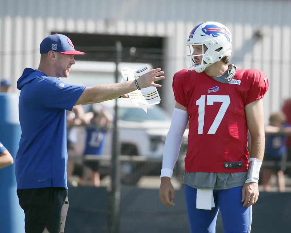 Bills quarterback Josh Allen talks with offensive coordinator Joe Brady during the Buffalo Bills training camp Wednesday, Sept. 7, 2024 at St. John Fisher University.