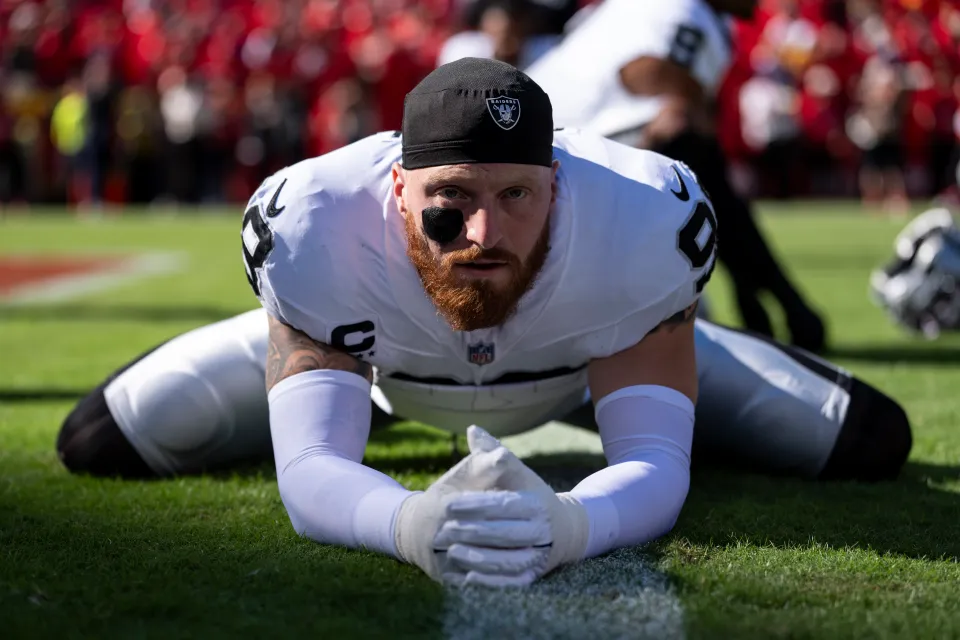 Maxx Crosby #98 of the Las Vegas Raiders looks on as he stretches prior to an NFL football game against the Kansas City Chiefs