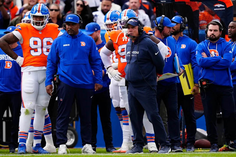 Denver Broncos head coach Sean Payton with members of his staff.Ron Chenoy-Imagn Images