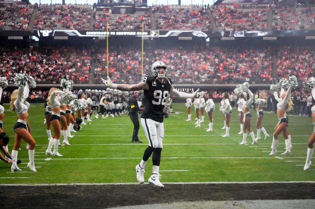 Las Vegas Raiders defensive end Maxx Crosby takes the field prior to a game against the Denver Broncos at Allegiant Stadium. Kirby Lee-Imagn Images