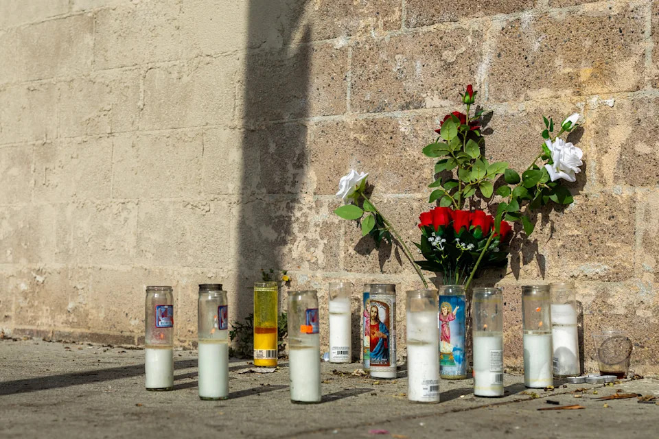 A memorial for former NFL and Westchester High lineman Kevin Johnson sit near a homeless encampment in L.A.  (Ronaldo Bolaños / Los Angeles Times via Getty Images file)