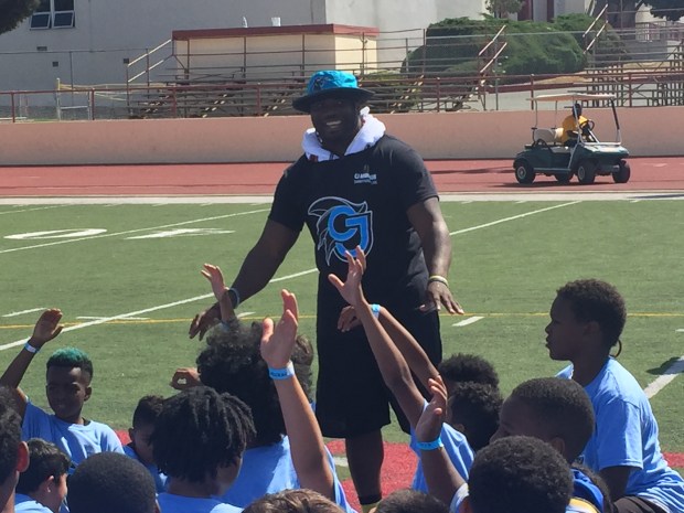 C.J. Anderson is shown at Vallejo High's Corbus Field during one of his free football camps he's hosted. Anderson will be hosting a free event at Jesse Bethel High on Wednesday for parents to discuss upcoming projects and events for Vallejo's youth. (Thomas Gase -- Times-Herald file)