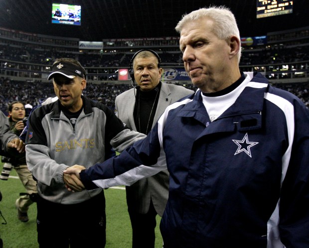 Cowboys coach Bill Parcells, right, shakes hands with Saints coach Sean Payton after the Saints defeated the Cowboys 42-17 in an NFL football game in Irving, Texas on Dec. 10, 2006. (AP Photo/Matt Slocum, file)