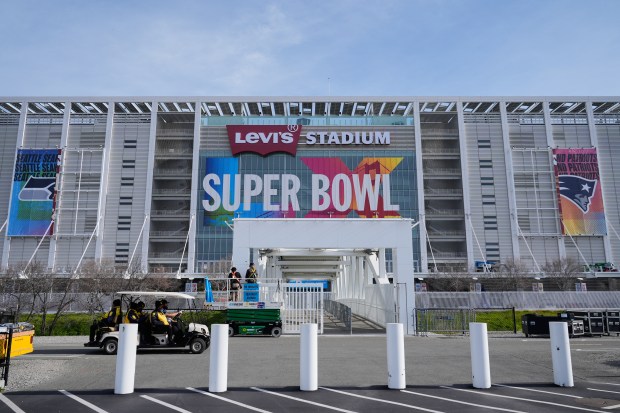Workers get Levi's Stadium ready for Super Bowl LX between the Seattle Seahawks and the New England Patriots in Santa Clara, Calif., Saturday, Jan. 31, 2026. (AP Photo/Godofredo A. Vásquez)