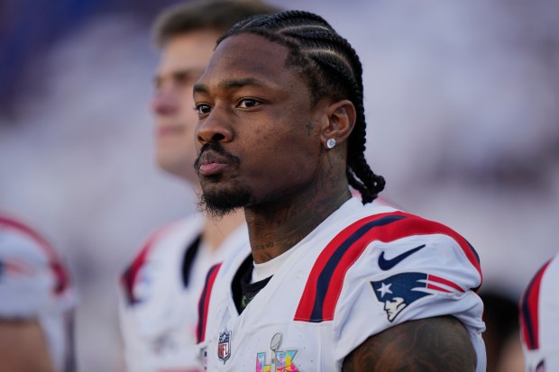 New England Patriots wide receiver Stefon Diggs (8) stands on the sidelines before taking on the Seattle Seahawks in the NFL Super Bowl LX game, Sunday, Feb. 8, 2026 in Santa Clara, Calif. (AP Photo/Doug Benc)