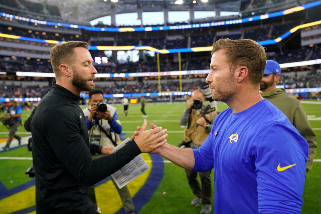 Rams coach Sean McVay shaking hands with Cardinals coach Kliff Kingsbury.