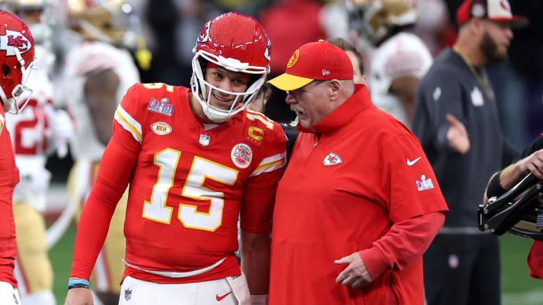 Patrick Mahomes #15 of the Kansas City Chiefs talks with head coach Andy Reid before Super Bowl LVIII against the San Francisco 49ers at Allegiant Stadium on February 11, 2024