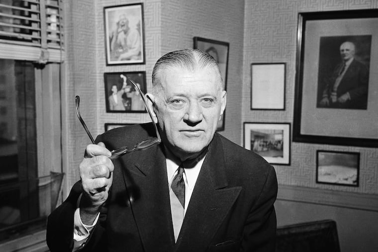 In this Feb. 13, 1957, file photo, NFL Commissioner Bert Bell gestures in his office in Philadelphia. His creation, the NFL draft, has become an industry unto itself and the league's third-most popular annual event behind the Super Bowl and opening weekend.