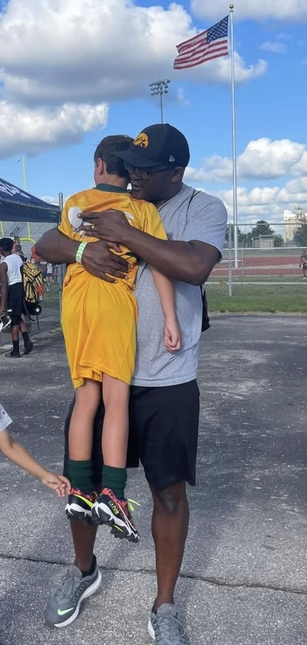 Burrell hugging Bodie Johnson after loss