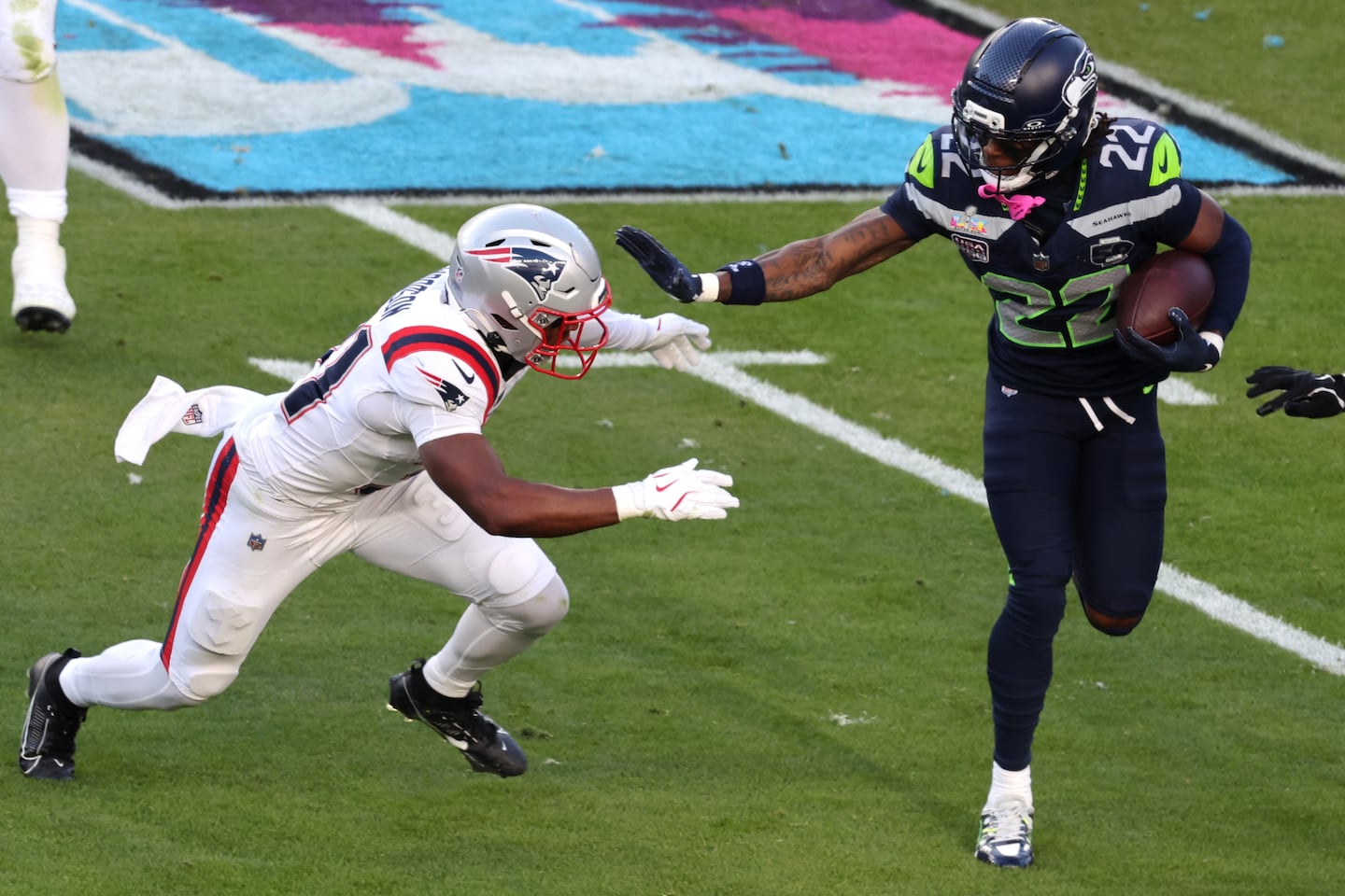 Patriots safety Craig Woodson had an outstanding game against Rashid Shaheed (22) and the Seahawks in the Super Bowl. 