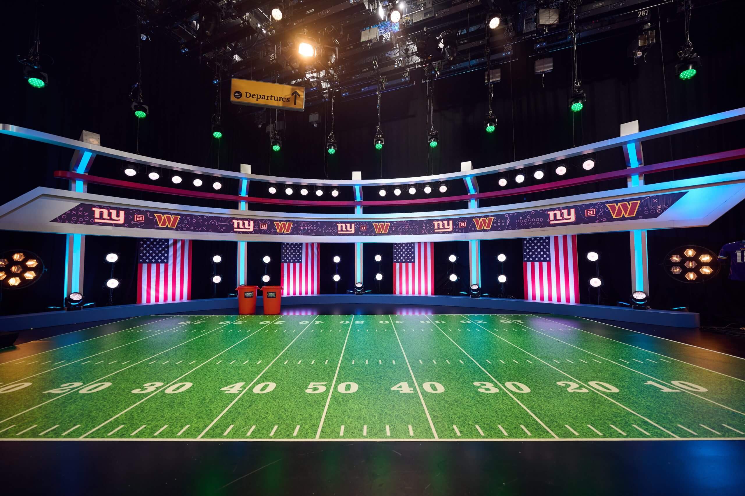 A picture of a mock up football field in the Channel 5 studio