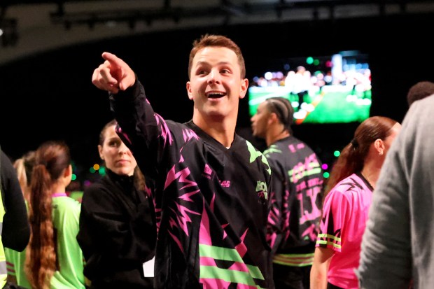 San Francisco 49ers quarterback Brock Purdy interacts with fans before coaching the girls' flag football Pink Team against the Green Team in a glow-in-the-dark showcase on the Pro Bowl field at Moscone Center in San Francisco, Calif., on Wednesday, Feb. 4, 2026. (Ray Chavez/Bay Area News Group)