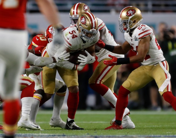 MIAMI GARDENS, FLORIDA - FEBRUARY 2: San Francisco 49ers' Fred Warner (54) intercepts the ball against the Kansas City Chiefs in the third quarter of Super Bowl LIV at Hard Rock Stadium in Miami Gardens, Fla., on Sunday, Feb. 2, 2020. (Nhat V. Meyer/Bay Area News Group)