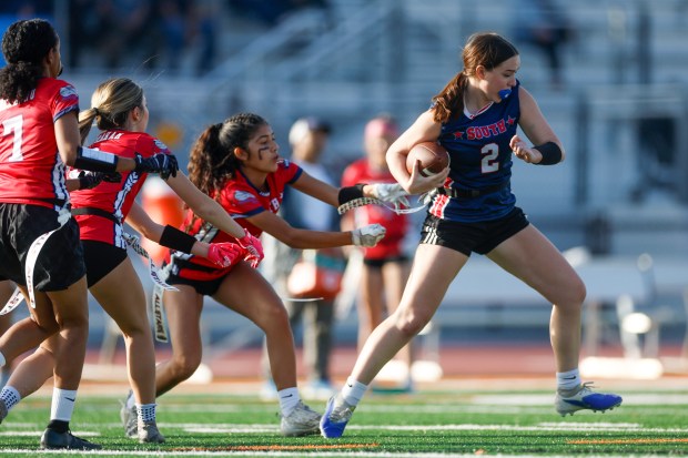 Wedemeyer South's Gabriella (Gigi) Gonzalez (2) runs with the ball against Wedemeyer North's Melia Morales (9), Wedemeyer North's Ashlyn Ingraham (3), and Wedemeyer North's Betty Bernahu (7) in the fourth quarter at Los Gatos High School in Los Gatos, Calif., on Saturday, Jan. 31, 2026. (Shae Hammond/Bay Area News Group)