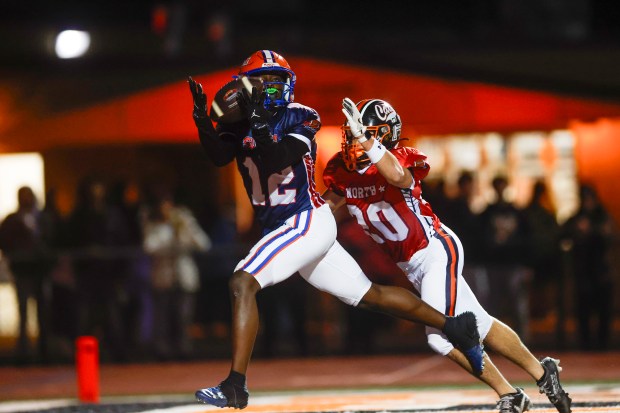 Wedemeyer North' Moussa Fall (12) catches the ball against Wedemeyer South' Kordell Crocker (20) in the third quarter at Los Gatos High School in Los Gatos, Calif., on Saturday, Jan. 31, 2026. (Shae Hammond/Bay Area News Group)
