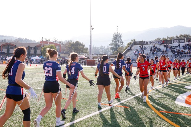 Wedemeyer North and Wedemeyer South for flag football high five after the game at Los Gatos High School in Los Gatos, Calif., on Saturday, Jan. 31, 2026. (Shae Hammond/Bay Area News Group)