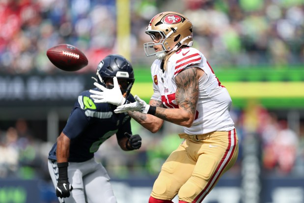 George Kittle #85 of the San Francisco 49ers catches a pass against Coby Bryant #8 of the Seattle Seahawks during the first quarter during the game at Lumen Field on Sept. 07, 2025 in Seattle, Washington. (Photo by Steph Chambers/Getty Images)