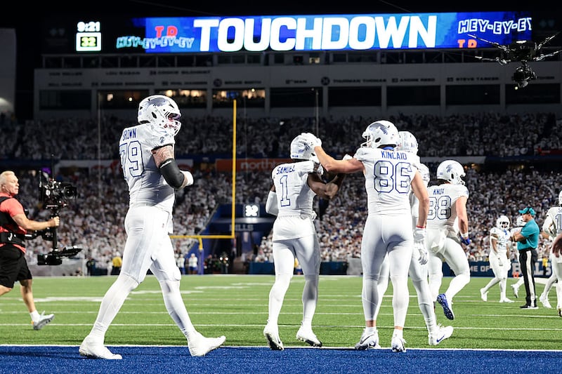 ORCHARD PARK, NEW YORK - OCTOBER 5: Curtis Samuel #1 of the Buffalo Bills celebrates with teammates after scoring a touchdown during the third quarter against the New England Patriots at Highmark Stadium on October 5, 2025 in Orchard Park, New York. (Photo by Kathryn Riley/Getty Images)