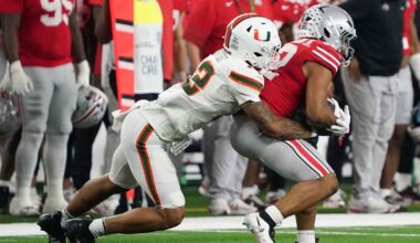 Miami's Jakobe Thomas (8) and Bryce Fitzgerald (13) get the crowd hyped during the College Football Playoff National Championship college football game at Hard Rock Stadium in Miami Gardens on Monday, Jan. 19, 2026.