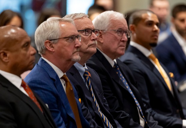 Kevin Warren, from left, Brian McCaskey, George McCaskey, Patrick McCaskey and Ryan Poles on Jan. 22, 2025, at Halas Hall. (Brian Cassella/Chicago Tribune)