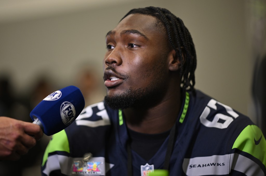 Seahawks offensive lineman Charles Cross talks to the media on Feb 4, 2026 before Sunday's Super Bowl.