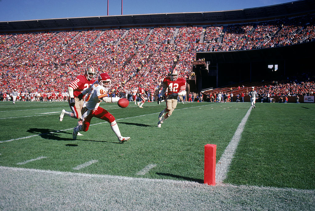 Wide receiver Carlos Carson #88 of the Kansas City Chiefs can't make the reception while covered by cornerback Dwight Hicks #22 of the San Francisco 49ers during a game at Candlestick Park on November 17, 1985 in San Francisco, California. The 49ers won 31-3