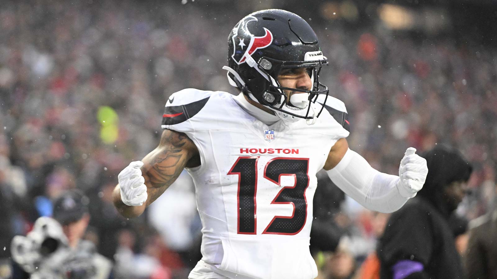 Houston Texans wide receiver Christian Kirk (13) celebrates a touchdown in the second quarter against the New England Patriots in an AFC Divisional Round game at Gillette Stadium.