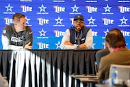 New Dallas Cowboys defensive coordinator Christian Parker (right) addresses reporters...