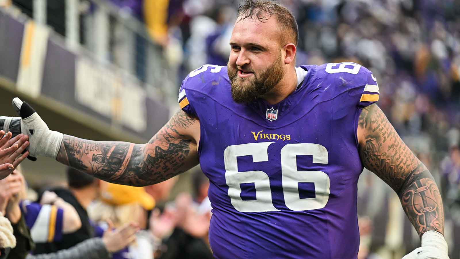 Minnesota Vikings guard Dalton Risner (66) reacts with the crowd after the game against the Arizona Cardinals at U.S. Bank Stadium.