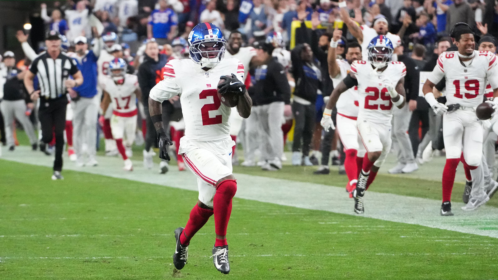 New York Giants cornerback Deonte Banks (2) returns a punt for a touchdown in the second half against the Las Vegas Raiders at Allegiant Stadium.