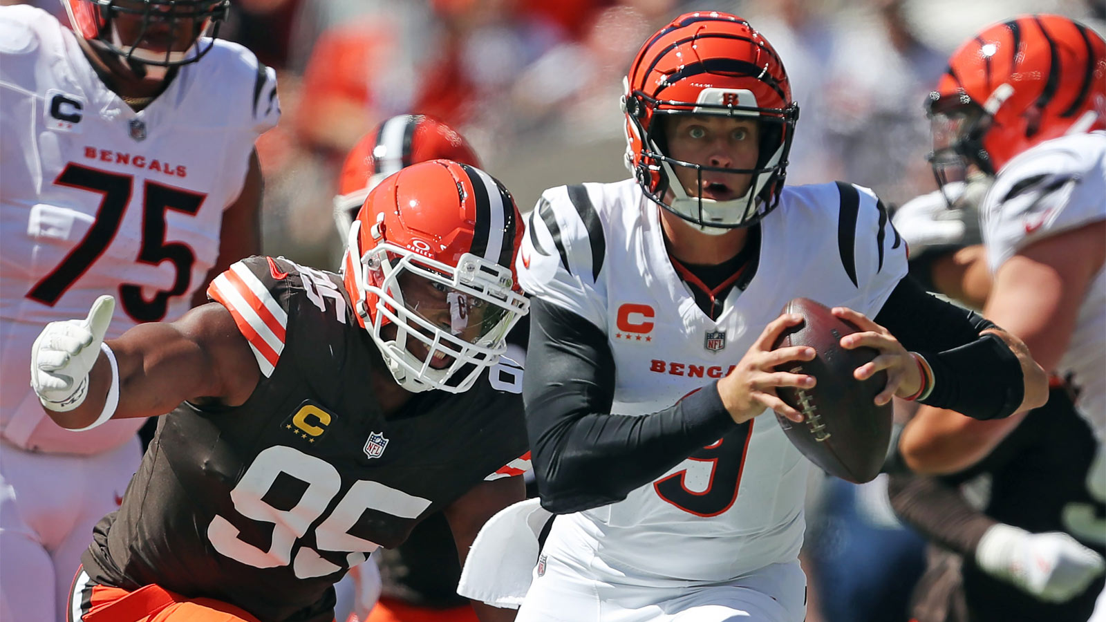 Cleveland Browns defensive end Myles Garrett (95) chases down Cincinnati Bengals quarterback Joe Burrow (9) during the first half of an NFL football game at Huntington Bank Field, Sept. 7, 2025, in Cleveland, Ohio.