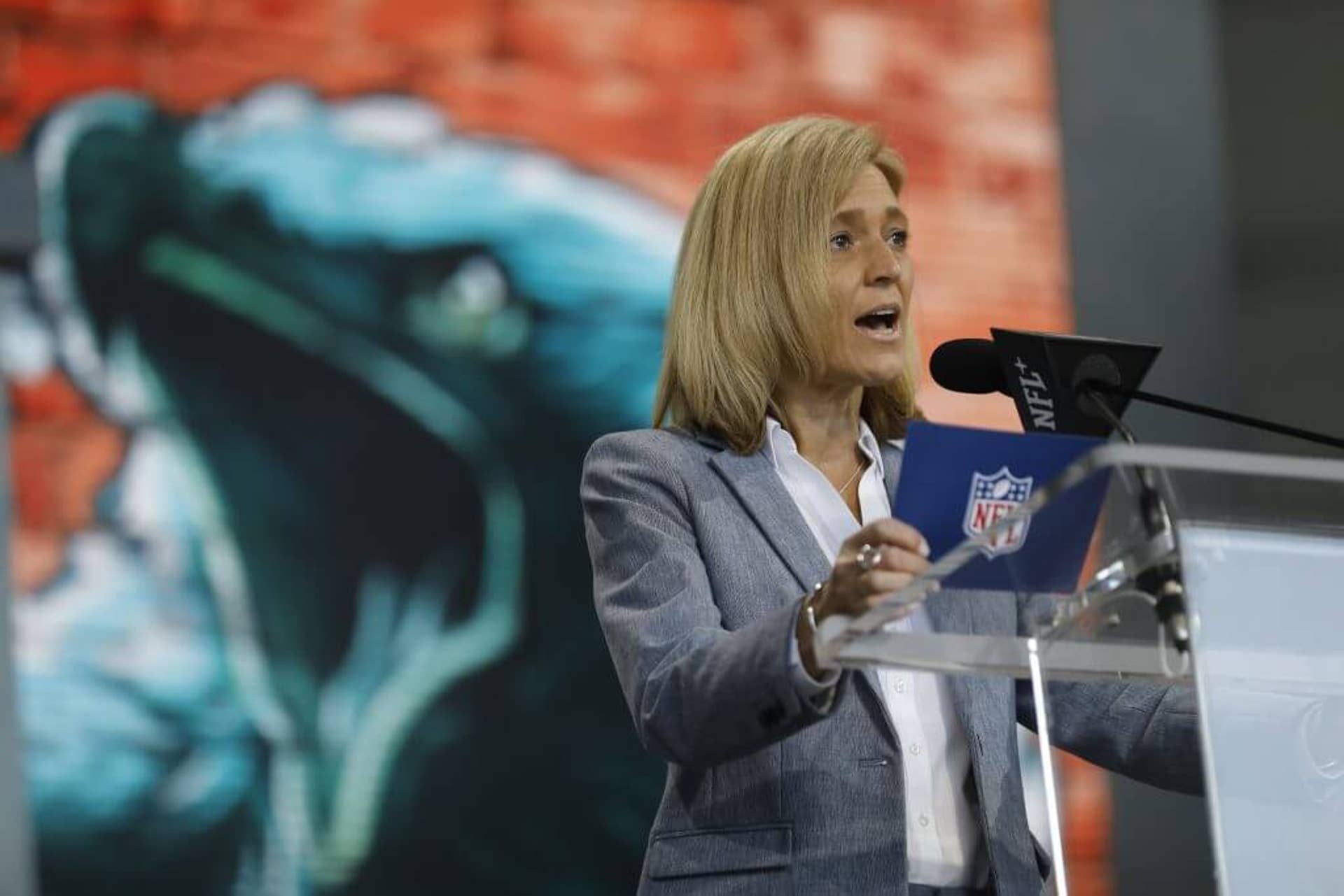 Dawn Aponte, Chief Football Administrative Officer with the NFL, announces a fourth round draft pick selection during the 2023 NFL Draft at Union Station on April 29, 2023 in Kansas City, Missouri.