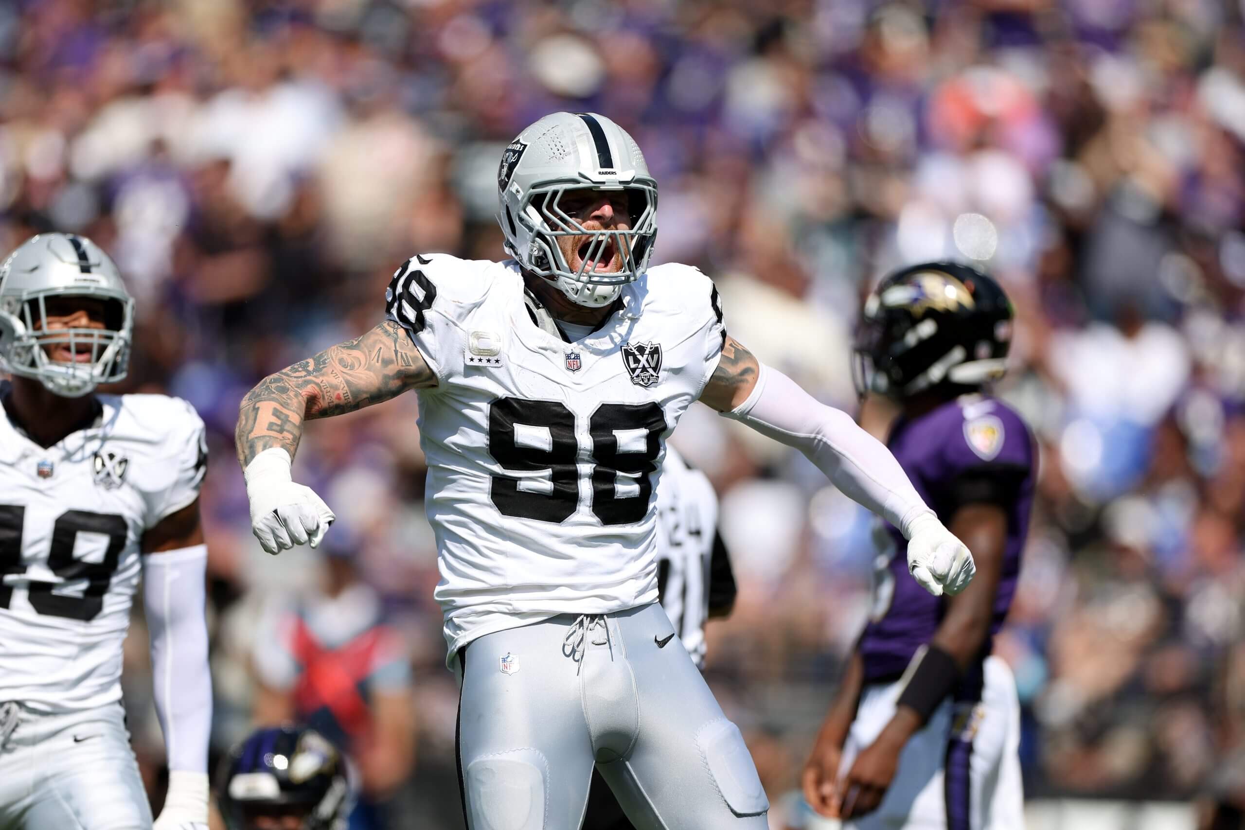 BALTIMORE, MARYLAND - SEPTEMBER 15: Maxx Crosby #98 of the Las Vegas Raiders celebrates after making a tackle against the Baltimore Ravens at M&T Bank Stadium on September 15, 2024 in Baltimore, Maryland. 