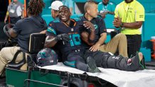 Miami Dolphins wide receiver Tyreek Hill (10) is carted off after an injury in the second half of the NFL game against the New York Jets at Hard Rock Stadium in Miami Gardens, Florida, on Monday, Sept. 29, 2025. (Al Diaz/Miami Herald/Tribune News Service via Getty Images)