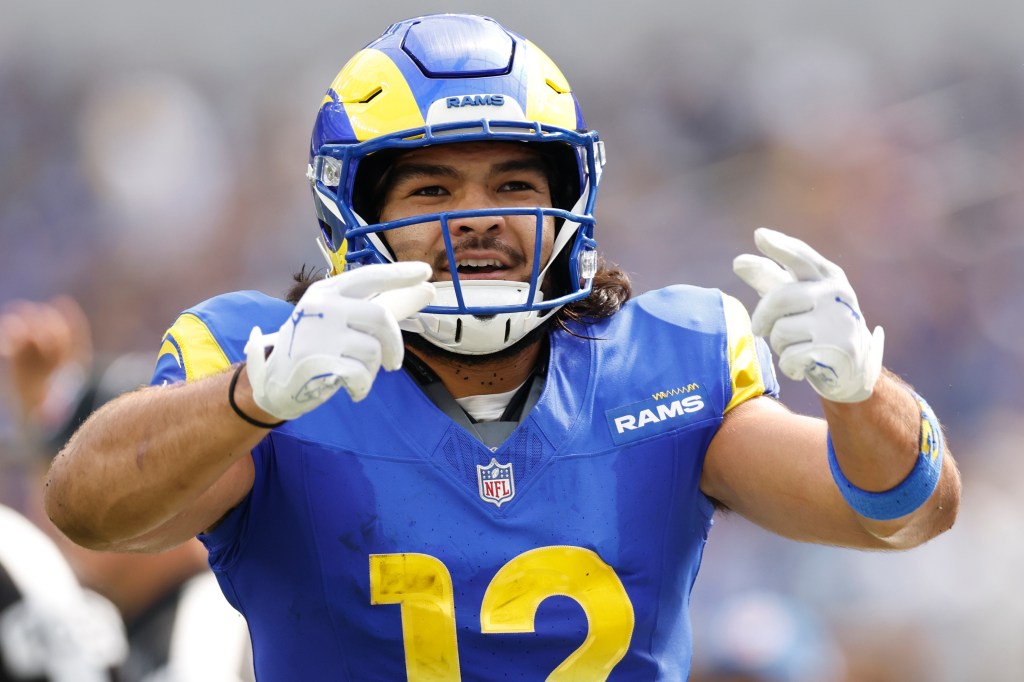 Rams receiver Puka Nacua celebrates during a game. 