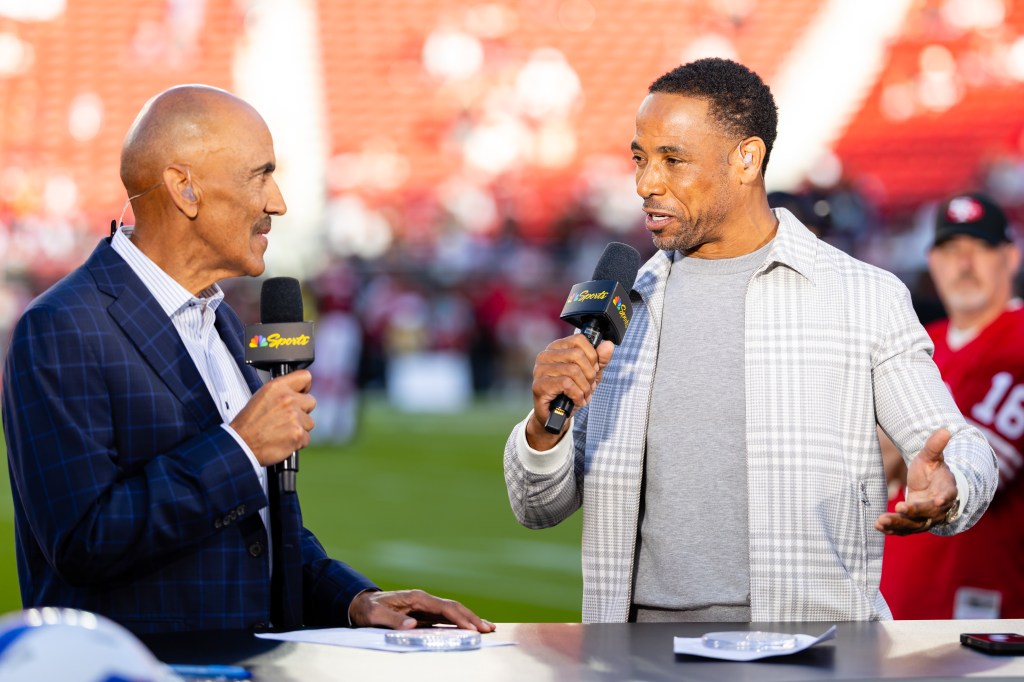 NBC Sports announcer Rodney Harrison interacts with Tony Dungy "Football Night in America" before a NFL game between the Atlanta Falcons and the San Francisco 49ers on October 19, 2025 at Levi's Stadium in Santa Clara, CA. 