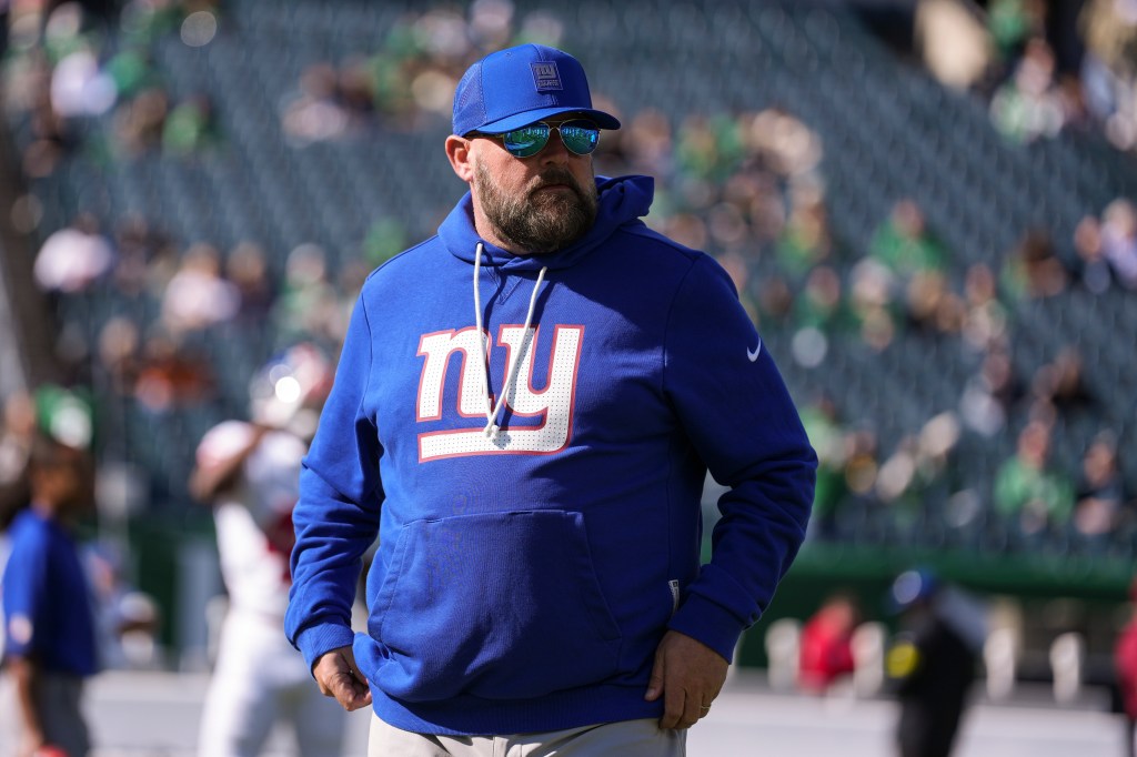 Brian Daboll of the New York Giants looks on from the field during warmups prior to an NFL football game against the Philadelphia Eagles at Lincoln Financial Field on October 26, 2025 in Philadelphia, Pennsylvania.