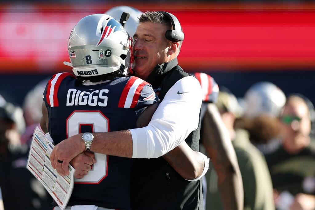 Patriots head coach Mike Vrabel embraces receiver Stefon Diggs during a win over the Atlanta Falcons.