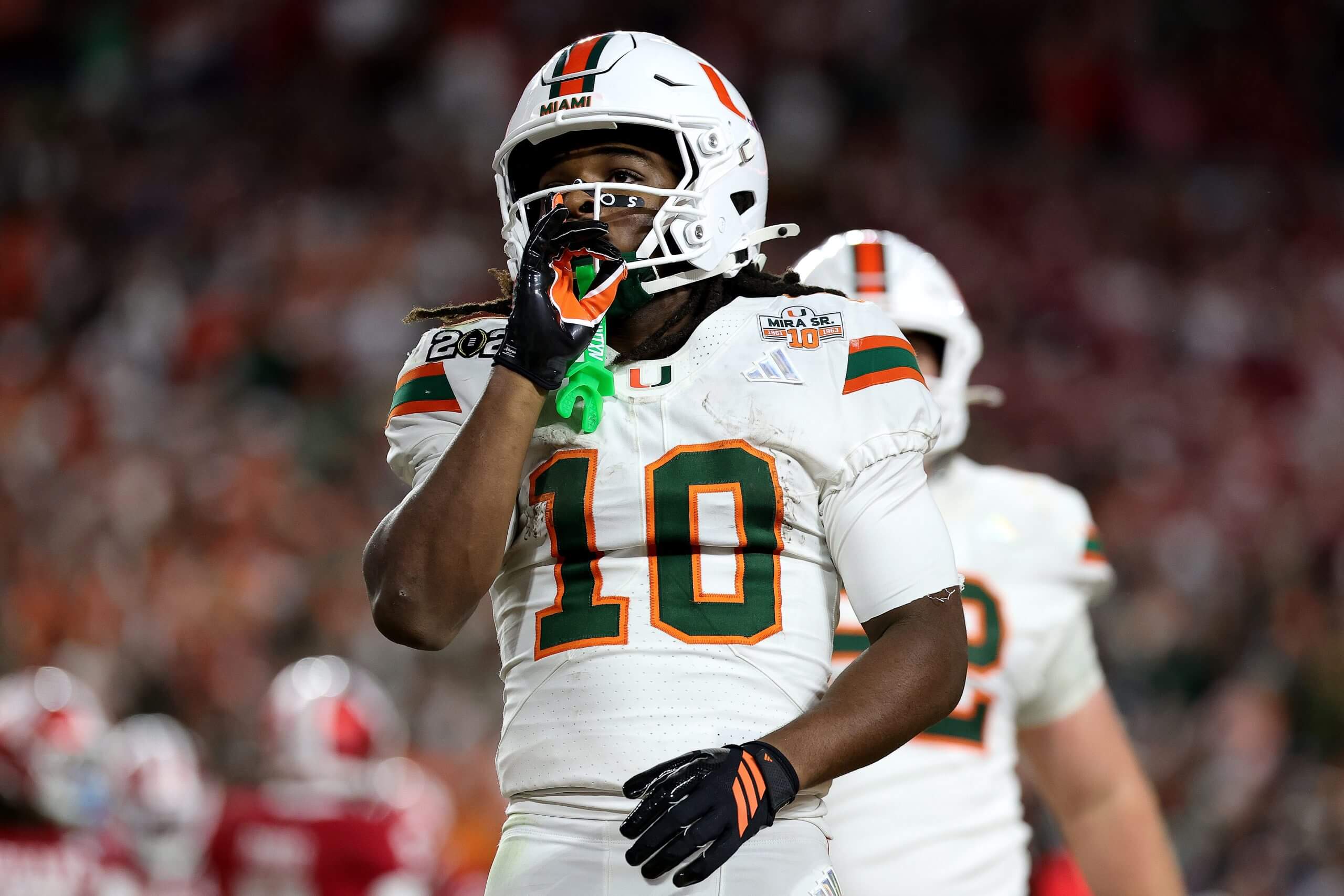 Miami's Malachi Toney shushes the crowd. 